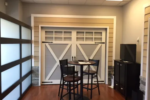 a room with a table and chairs