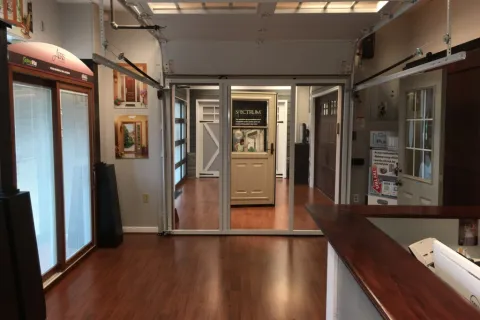 a room with a wood floor and a wood floor