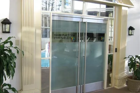 a glass door with a glass window