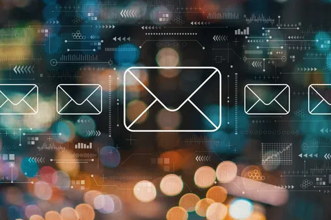 Email icons floating over a blurred cityscape background with digital data and network graphics