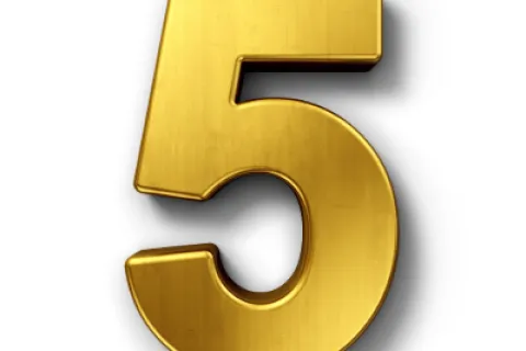 Shiny metallic gold number 5 with shadow on a white background