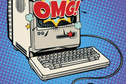 Vintage computer with keyboard and mouse displaying a comic-style OMG explosion on screen with colorful stars.