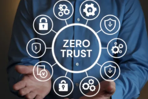 Businessman presenting a digital hologram illustrating zero trust security with icons of locks and gears