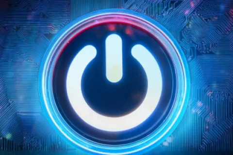 Glowing power button symbol in blue and red light with circuit board background and digital effects.