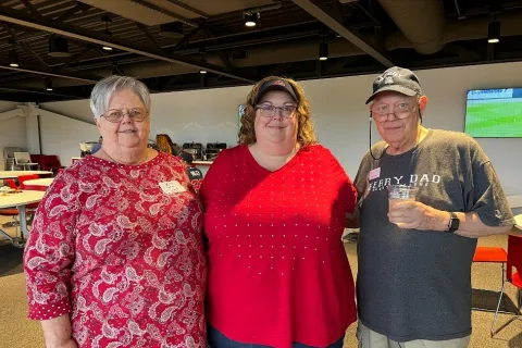 a group of people posing for a photo