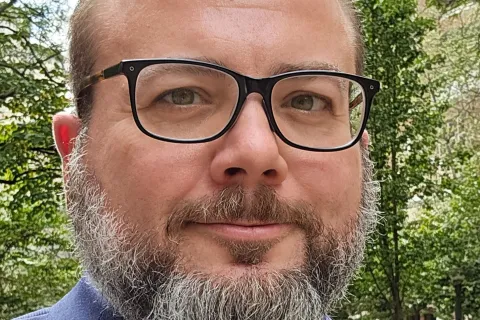 Dan Alban with a beard and glasses