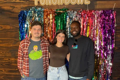 a group of people posing for the camera