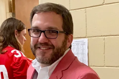 Berry alum Ted Goshord smiles at the camera