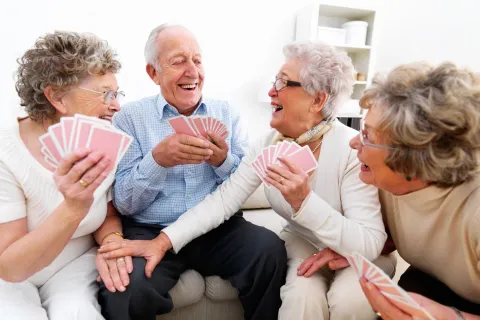 a group of old people laughing