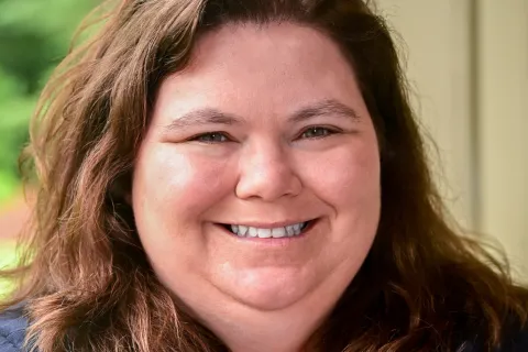a woman smiling for the camera