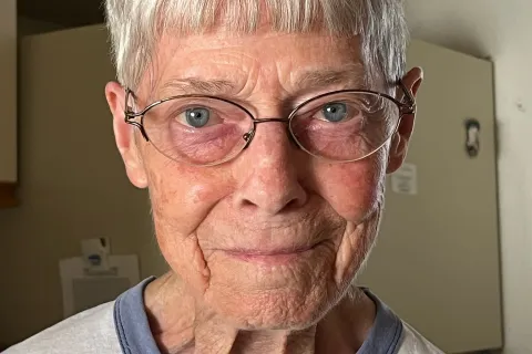a woman wearing glasses