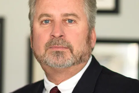 a man wearing a suit and tie