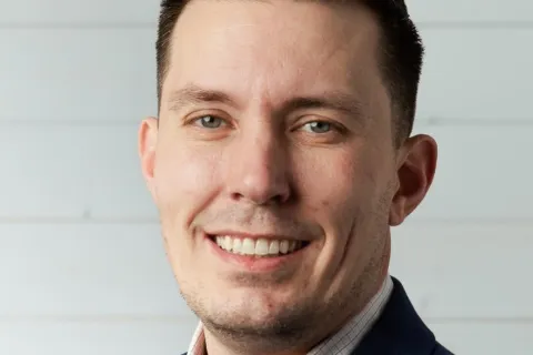 a man smiling for the camera