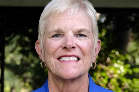 a woman smiling for the camera