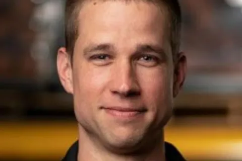 a man in a black uniform