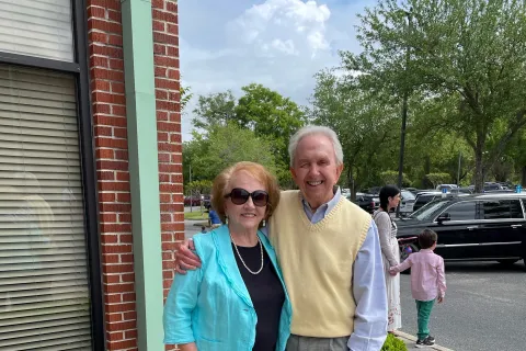 a man and woman posing for a picture