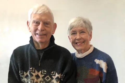 a man and woman smiling