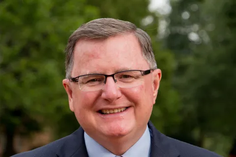 a man wearing a suit and tie