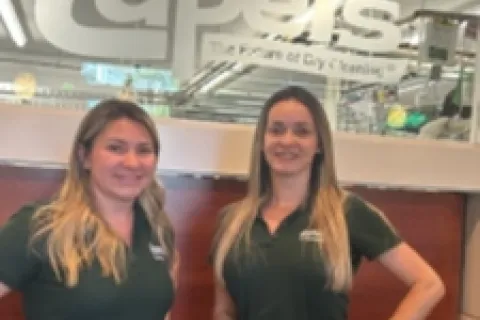 a couple of women posing for the camera