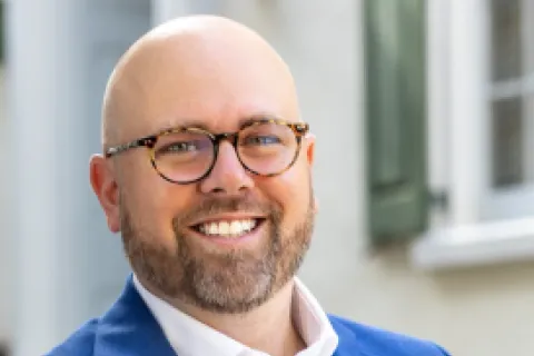 a man wearing glasses