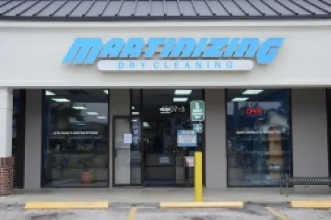 a store front with a sign