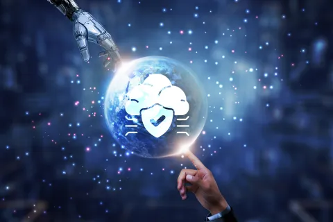 a hand holding a globe