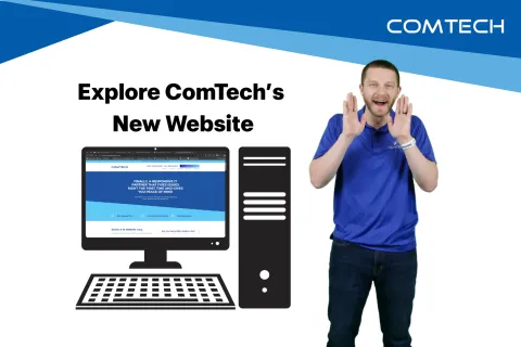Man in blue ComTech shirt promotes ComTech's new website with computer graphic and company logo