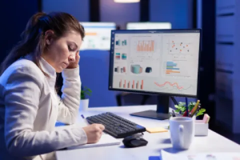 a woman sitting at a desk