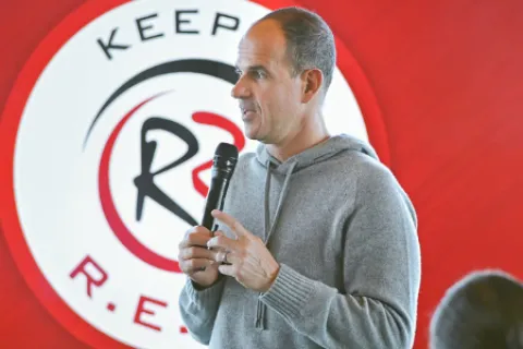 a man speaking into a microphone