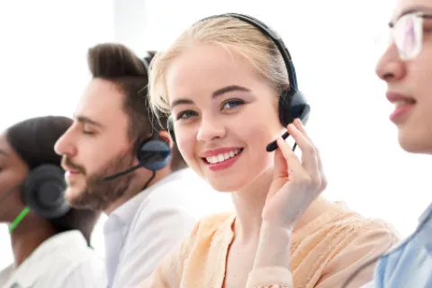a group of people wearing headsets