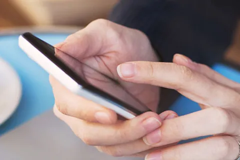 a person holding a phone