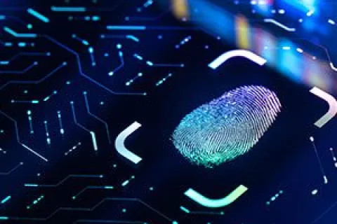 Digital fingerprint on a circuit board representing biometric security and cybersecurity technology.