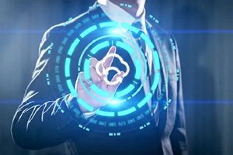 Businessman in suit interacting with glowing digital cloud icon and futuristic interface graphics
