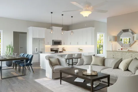 a large living room with modern furniture and a hard wood floor