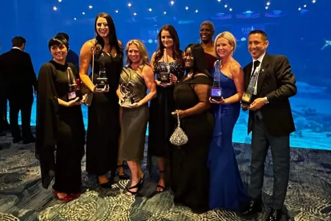 a group of people posing for a photo
