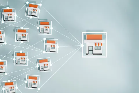 Network of connected small retail store icons with one highlighted, symbolizing franchise or business connections.