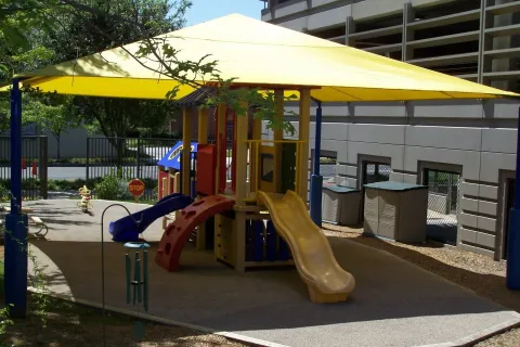 a play set outside a building