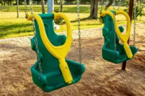 a playground with swing set