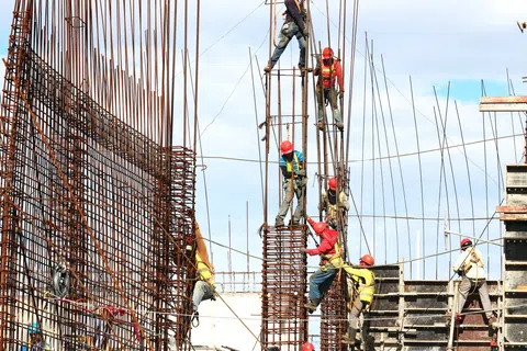 a group of men on a ladder