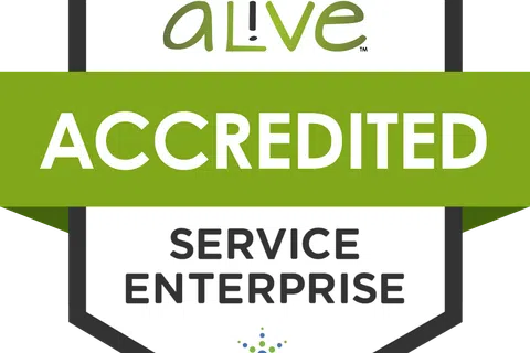 Alive Service Enterprise accreditation badge for 2026 to 2029 with green and white design.