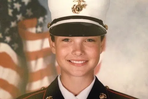 Marine veteran Ashley Chambless, manager of hospice care center in Winter Haven, wearing uniform