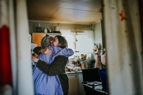 Caregiver visiting family member with dementia