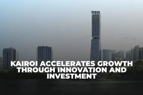 Modern city skyline with tall buildings and bold text about Kairoi's growth through innovation and investment.