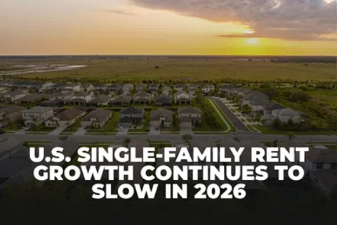 Aerial view of a suburban neighborhood at sunset with text about slowing U.S. single-family rent growth in 2026.