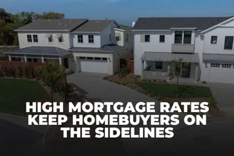 Modern suburban houses with text about high mortgage rates keeping homebuyers on sidelines.