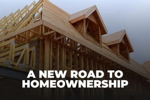Wooden frame of a house under construction with the text A New Road to Homeownership overlaid