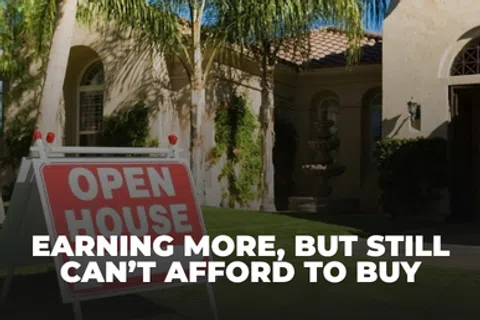 Open house sign on lawn of suburban home with text about earning more but unaffordable housing costs.