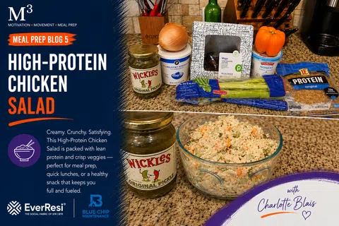 High-protein chicken salad ingredients and a bowl of creamy chicken salad on a kitchen countertop.