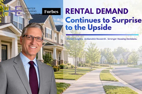 Professional man in suit stands in front of suburban homes with text about rising rental demand from Hunter Housing Economics and Forbes.