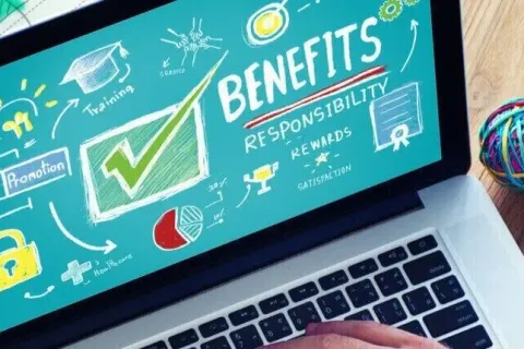 Person working on a laptop with visual elements highlighting benefits and responsibilities.